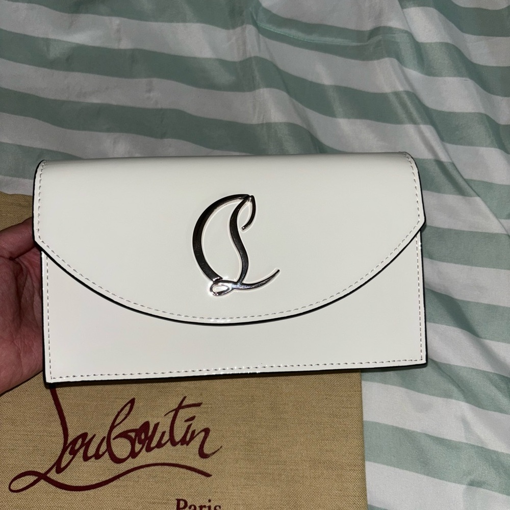 Cl Logo white patent leather clutch please don’t ask the obvious